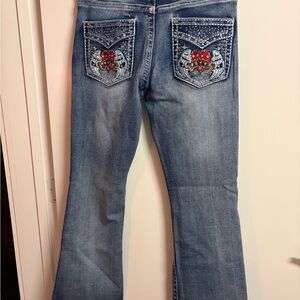Embellished Light Blue Flare Jeans with Decorative Back Pockets